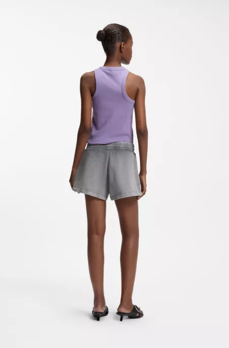 Relaxed-fit shorts in cotton terry with embossed logo