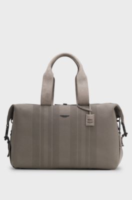 BOSS x ASTON MARTIN knitted holdall with suede trims, Light Grey