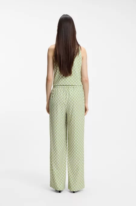 Relaxed-fit trousers with all-over print