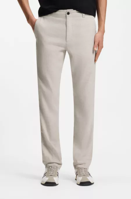 Pantalones en lino con detalle de logo