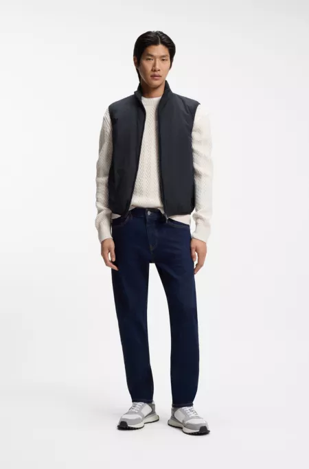 Water-repellent gilet with knitted trims