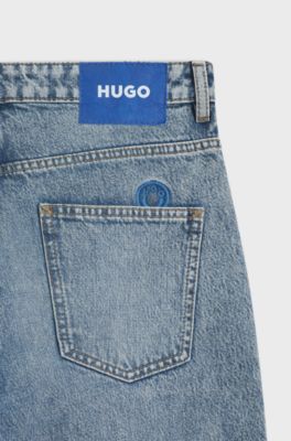 Jeans dalla vestibilit&agrave; comoda in denim blu con patta a vista, Celeste