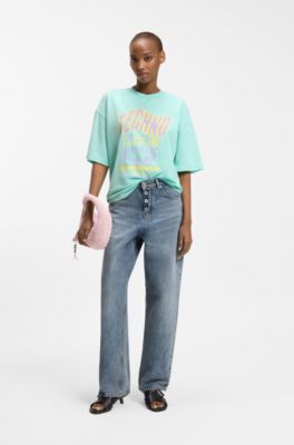 Jean coupe ample en denim bleu avec braguette apparente, bleu clair