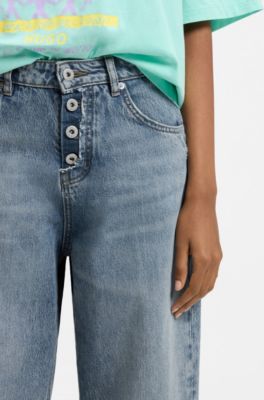 Jean coupe ample en denim bleu avec braguette apparente, bleu clair