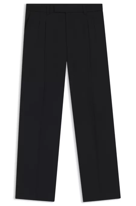 Pantalones tapered fit en lana virgen jaspeada