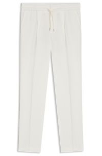 Slim-fit trousers in cotton and linen, White