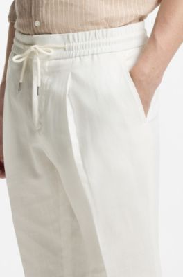 Slim-fit trousers in cotton and linen, White
