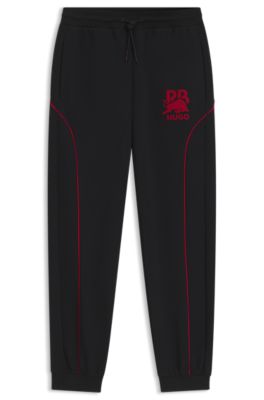 HUGO x RB stretch-cotton tracksuit bottoms with bull motif, Black