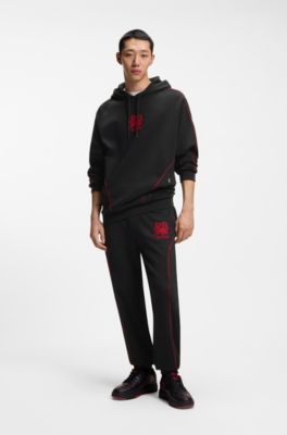 HUGO x RB stretch-cotton tracksuit bottoms with bull motif, Black