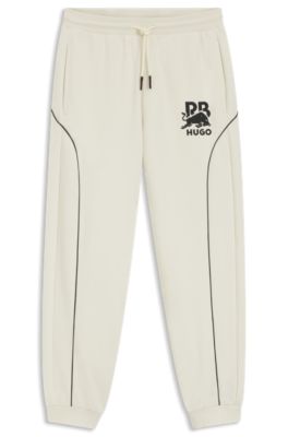 HUGO x RB stretch-cotton tracksuit bottoms with bull motif, Natural