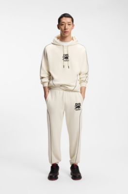 HUGO x RB stretch-cotton tracksuit bottoms with bull motif, Natural