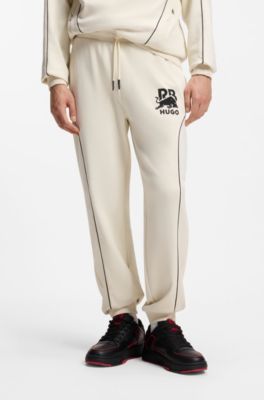 HUGO x RB stretch-cotton tracksuit bottoms with bull motif, Natural