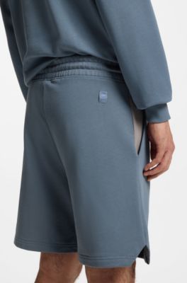 HUGO x RB-short van katoenen sweatstof met stiermotief, Blauw
