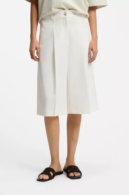 Bermuda trousers with front pleats
