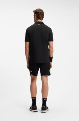 Stretch-cotton polo shirt with tennis-inspired logo, Black