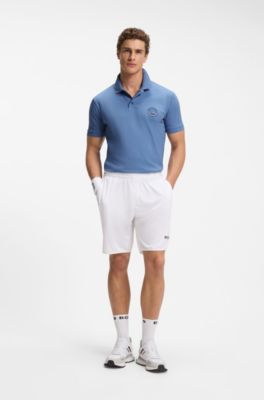 Stretch-cotton polo shirt with tennis-inspired logo, Blue