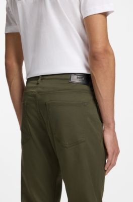 Porsche x BOSS Pantaloni con fit affusolato in denim elasticizzato, Oliva