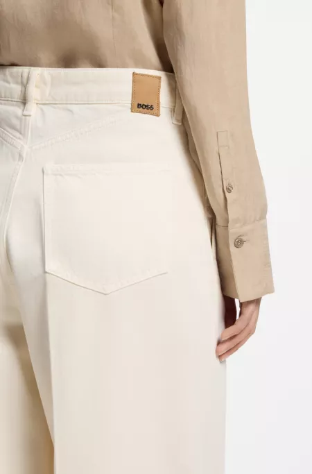 Wide-leg jeans in cream denim with front crease