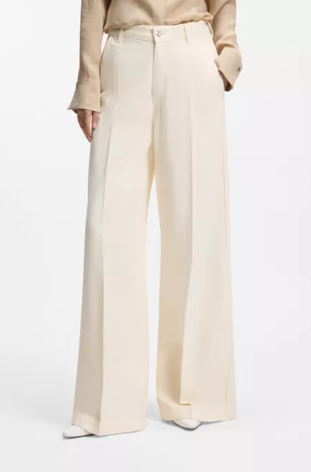 Wide-leg jeans in cream denim with front crease
