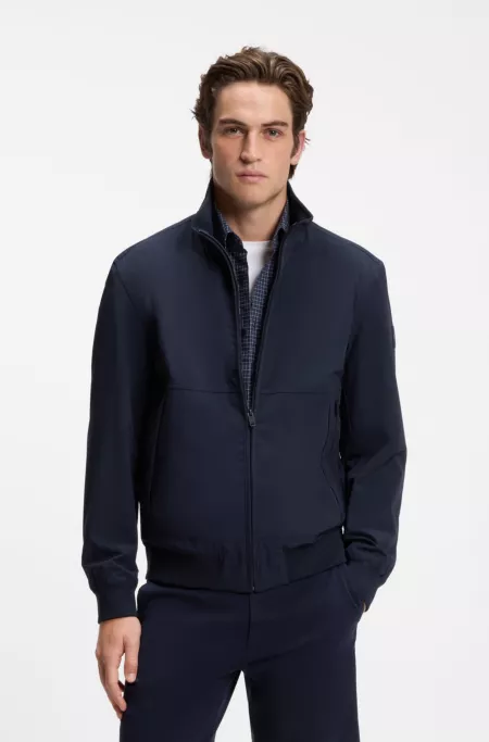 Veste déperlante en softshell à manches détachables