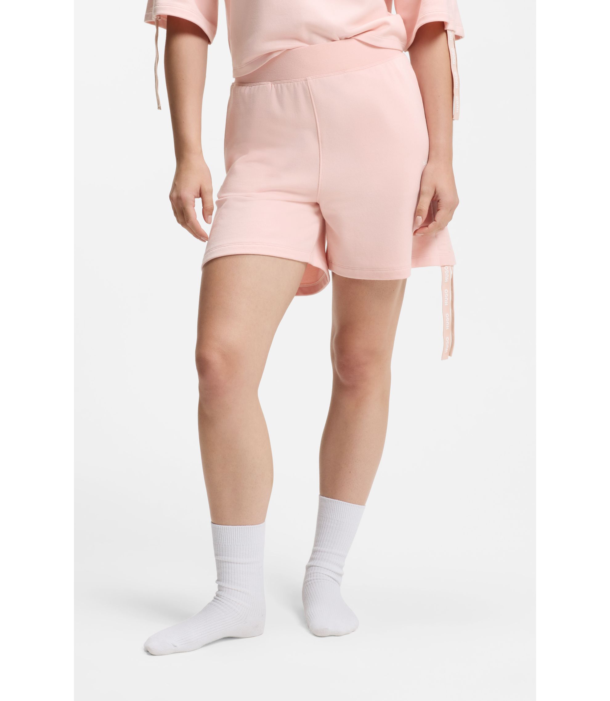 Shorts mit Logo-Print und gerafften Seiten