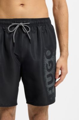 Quick-dry swim shorts with spray-effect logo, Black