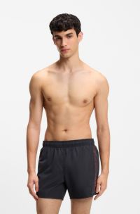 Quick-dry swim shorts with vertical printed logos, Black