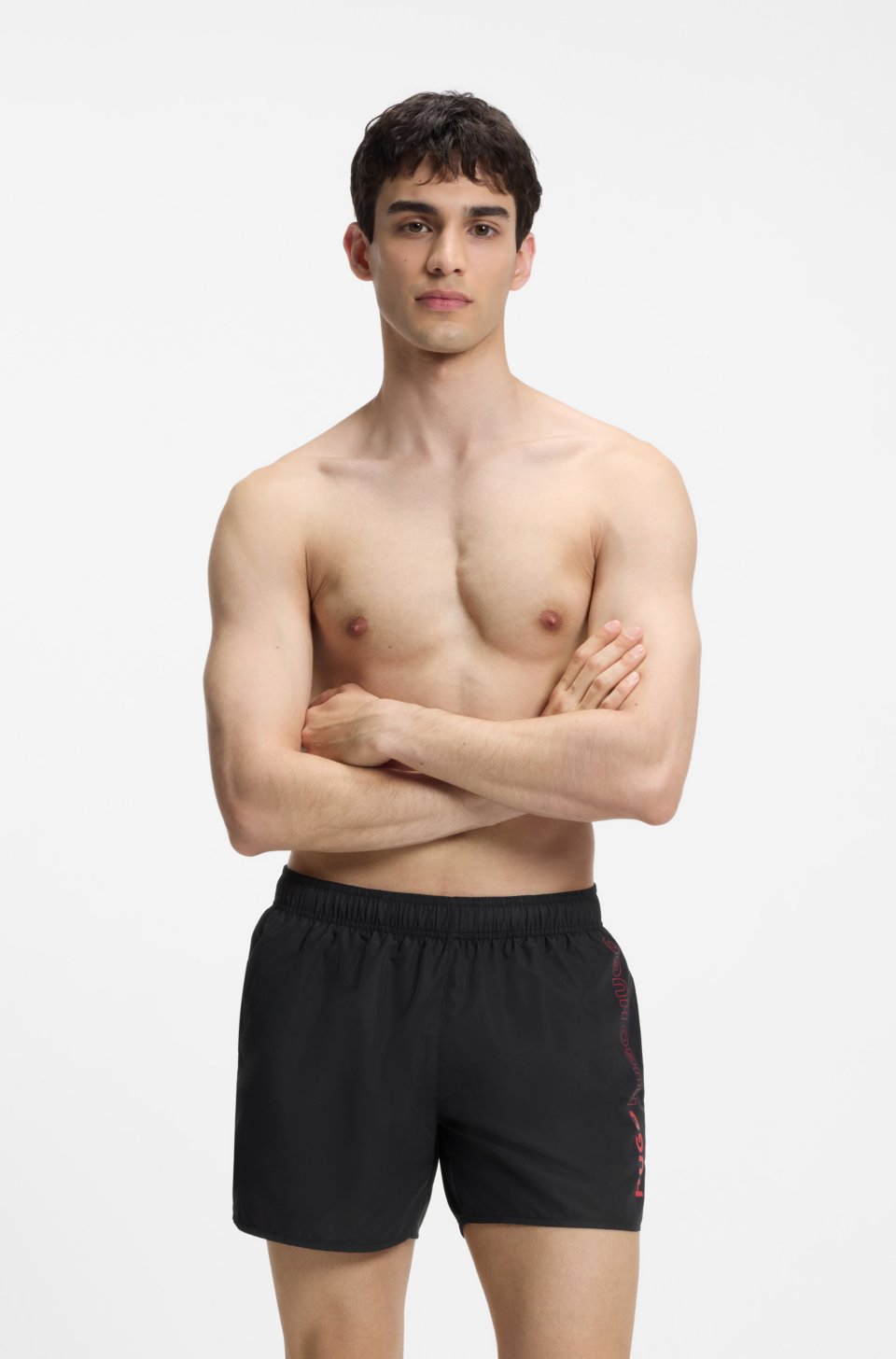 Swim shorts with repeat logos