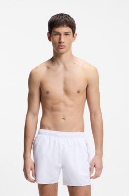Swim shorts with repeat logos, White