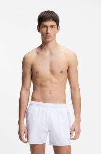 Swim shorts with repeat logos, White