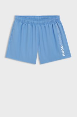 Swim shorts with repeat logos, Blue