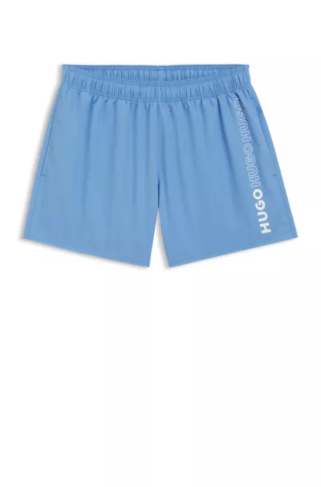 Swim shorts with repeat logos