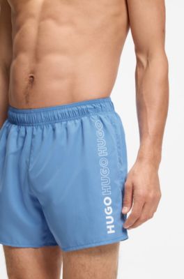 Swim shorts with repeat logos, Blue