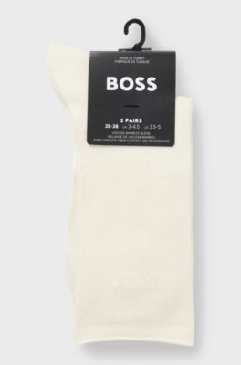 Pakke med to par str&oslash;mper med monogrammer og bambus samt almindelig l&aelig;ngde, Naturlig