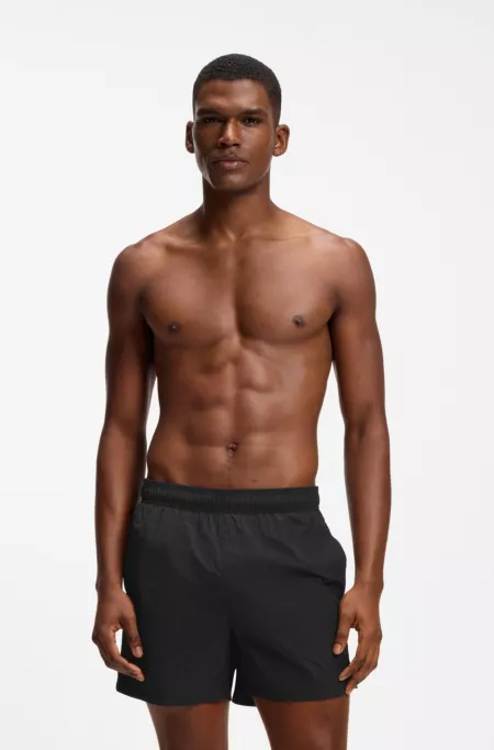 Short de bain avec bordure en monogramme Double B