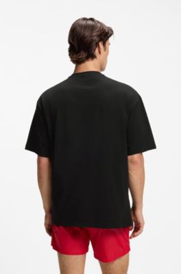 Oversized-fit T-shirt in cotton with repeat-logo print, Black