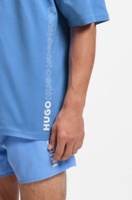 Oversized-fit T-shirt in cotton with repeat-logo print, Blue