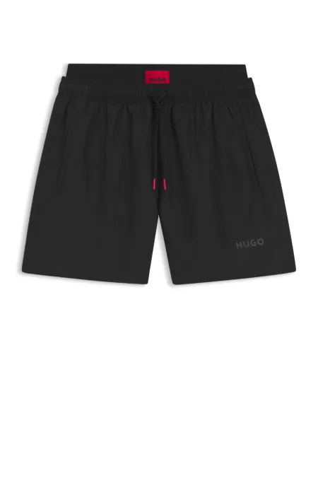Bañador tipo shorts con detalles de logo y cintura doble