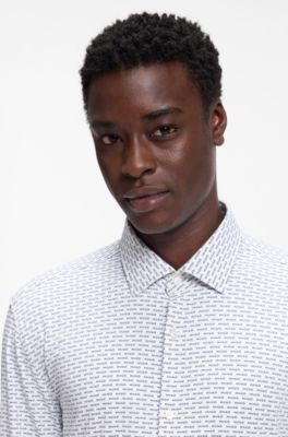 Camisa slim fit en punto el&aacute;stico estampado, Negro estampado