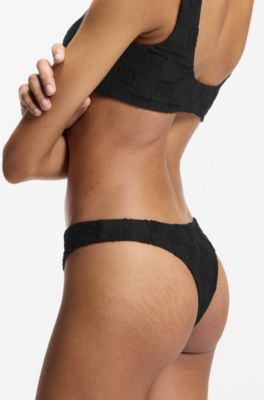 Braziliaans bikinibroekje van stretchbadstof met gelaagde logo&rsquo;s, Zwart