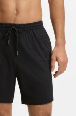 Quick-dry swim shorts in stretch seersucker, Black