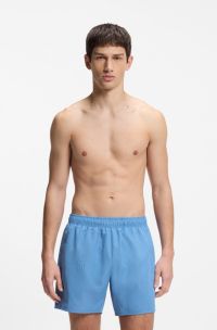 Swim shorts with all-over stacked logos, Blue