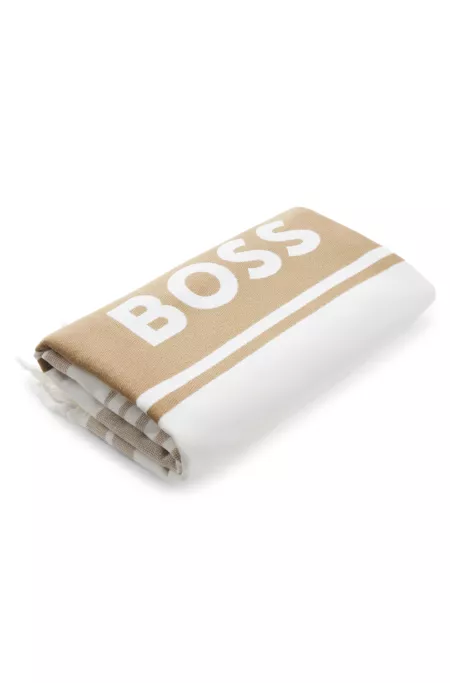 Fringed logo beach towel in cotton jacquard