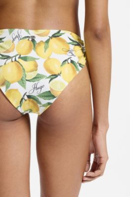 Printed bikini bottoms with stacked-logo charm, Yellow Patterned