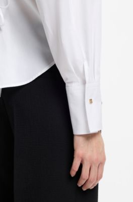 Blusa relaxed fit de algod&oacute;n con botones con logo apilado en los pu&ntilde;os, Blanco