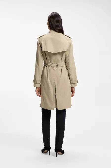Water-repellent trench coat with buckled belt