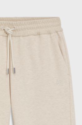 Relaxed-fit cotton-blend cuffed tracksuit bottoms, Natural