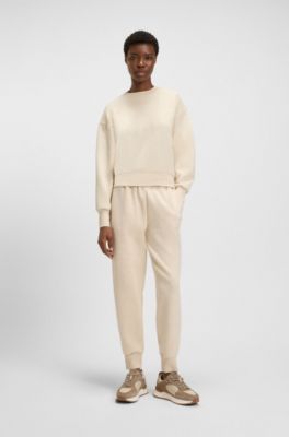Relaxed-fit cotton-blend cuffed tracksuit bottoms, Natural