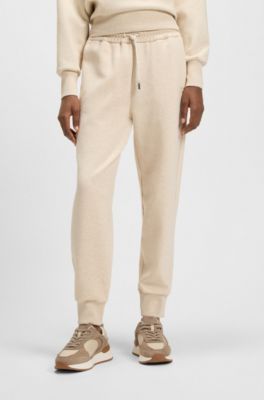 Relaxed-fit cotton-blend cuffed tracksuit bottoms, Natural