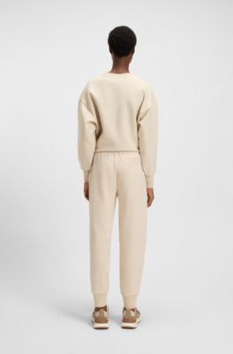 Relaxed-fit cotton-blend cuffed tracksuit bottoms, Natural